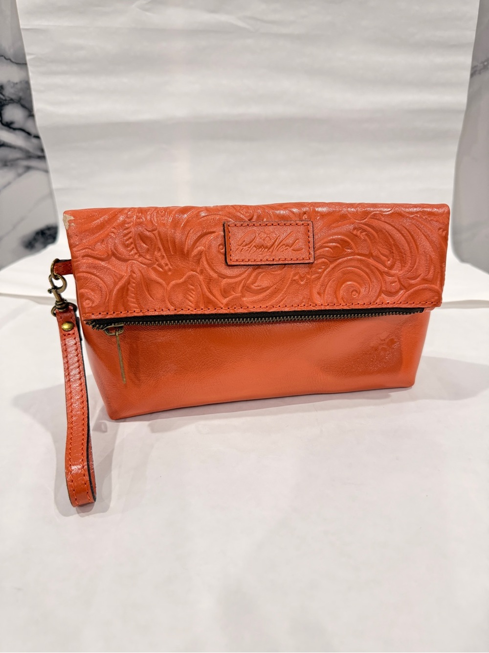 Patricia Nash Apricot Orange Embossed Leather Wristlet Clutch
